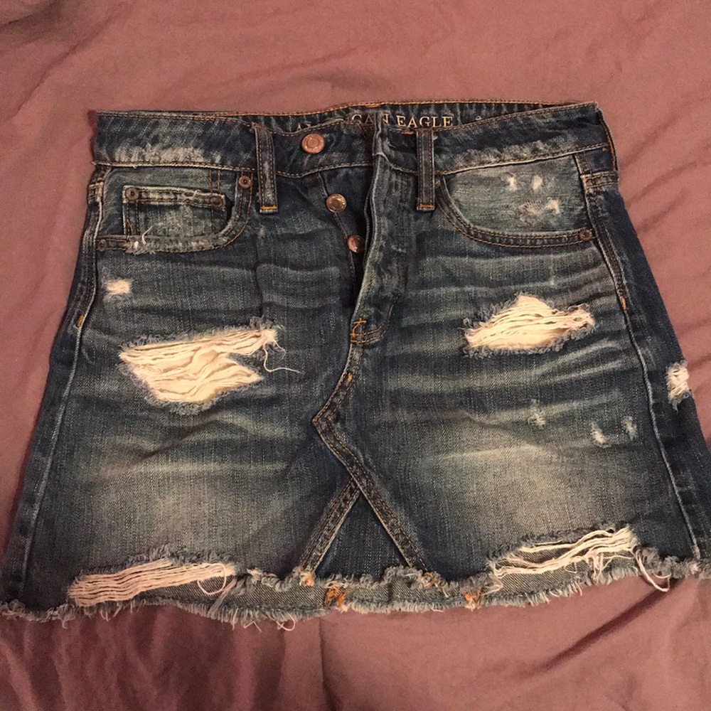 Ripped mini denim skirt